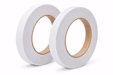 Two rolls of double-sided tissue tape